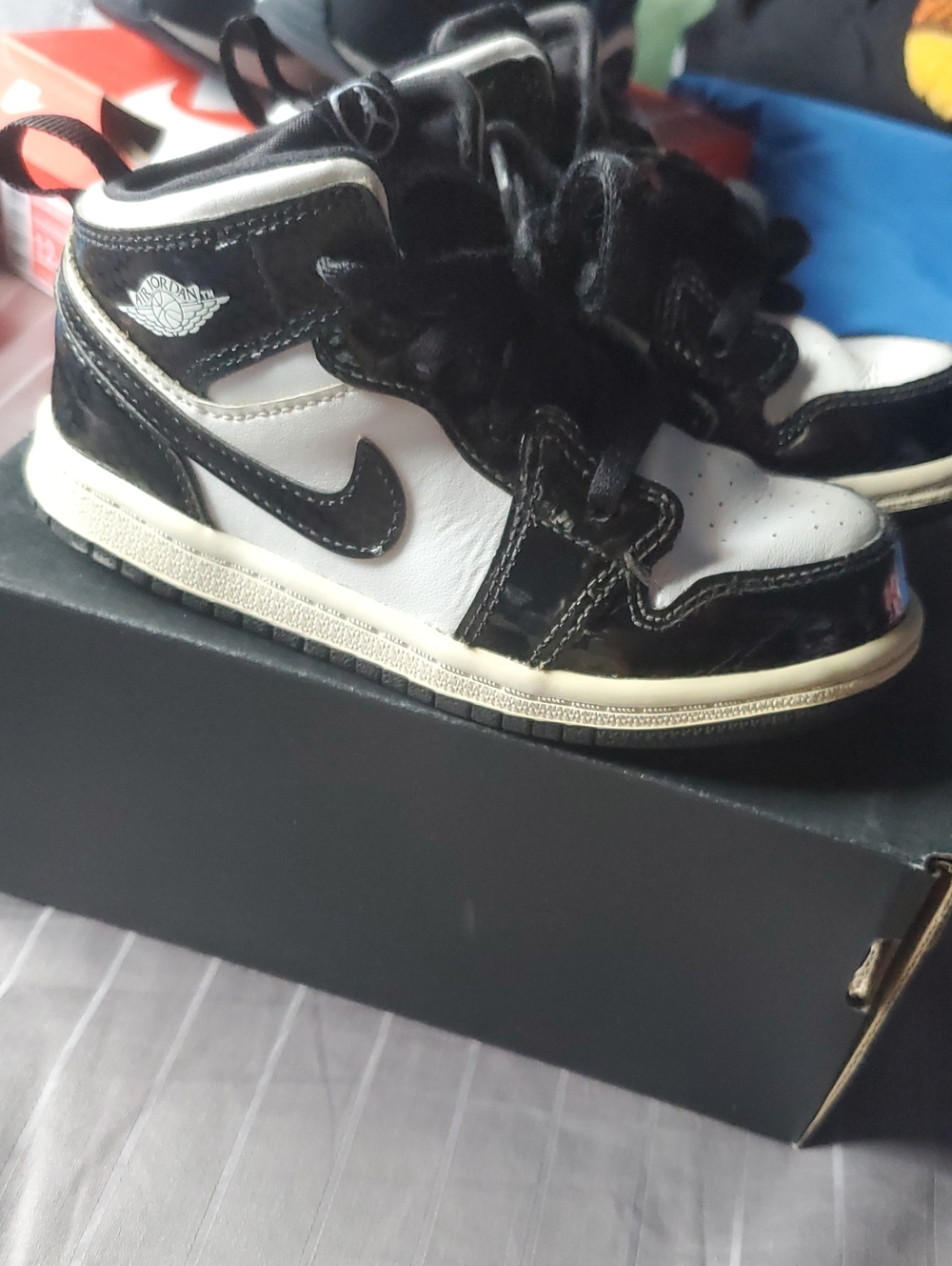Jordan Kids Black and White High-Top Sneakers